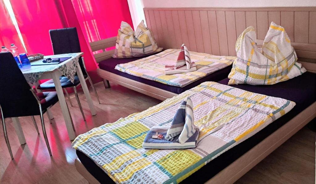 Postel nebo postele na pokoji v ubytování Ferienapartment-Leipzig-Plagwitz