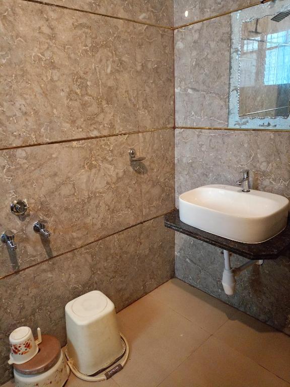 Koupelna v ubytování Hotel Sai Balaji