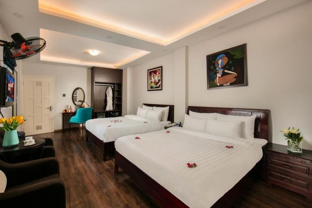 Postel nebo postele na pokoji v ubytování Labevie Hotel