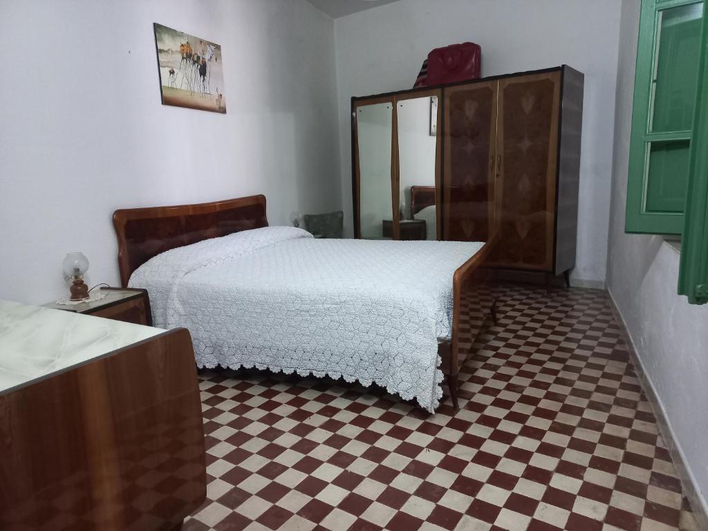 Postel nebo postele na pokoji v ubytování Is Brebus