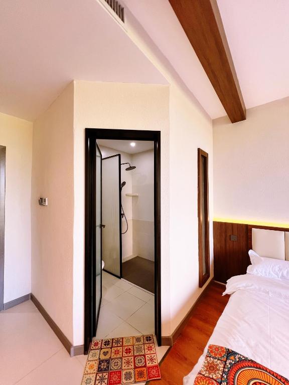 Postel nebo postele na pokoji v ubytování Kashgar QIu Ge Homestay