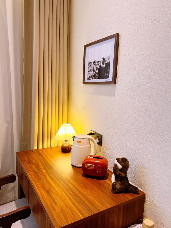 Příslušenství pro přípravu čaje a kávy v ubytování Kashgar QIu Ge Homestay