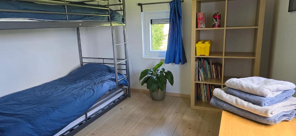 Postel nebo postele na pokoji v ubytování Maison des voisins