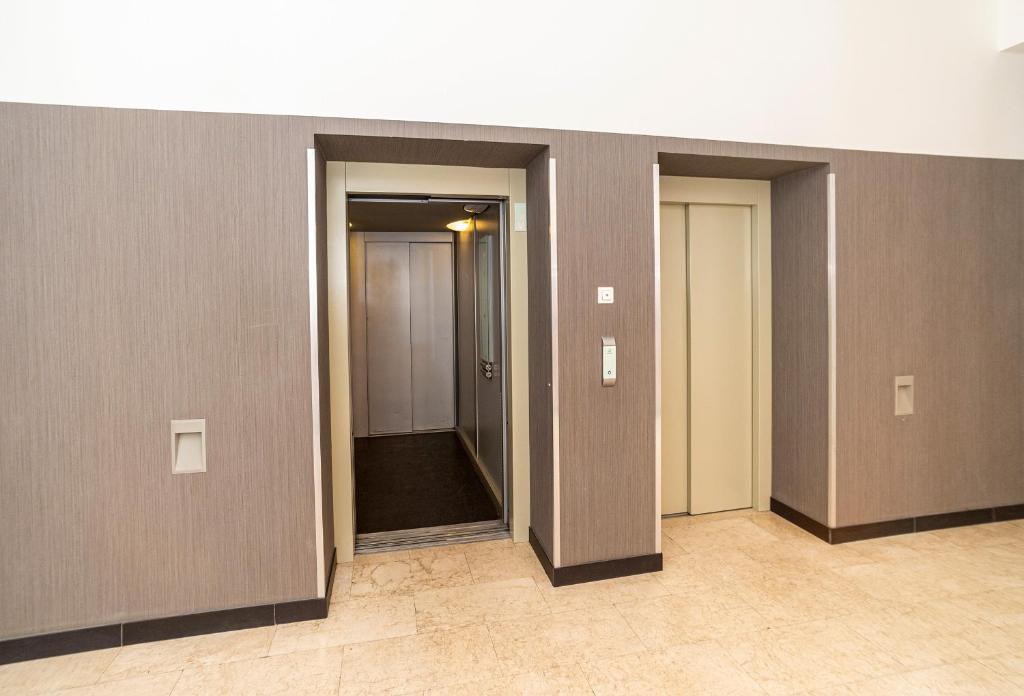 City Host Lofty Tymienieckiego - One-Bedroom Apartment