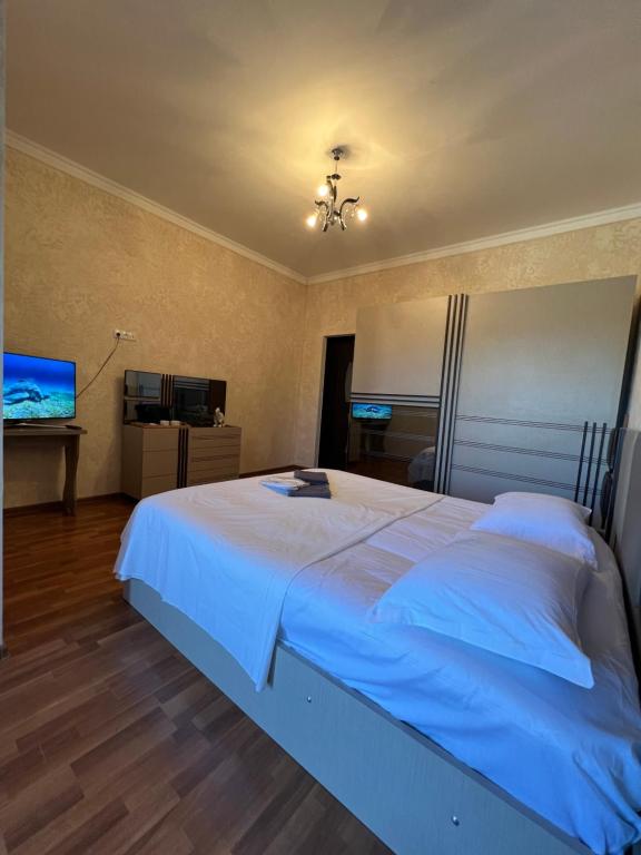 Postel nebo postele na pokoji v ubytování Nugo Villa