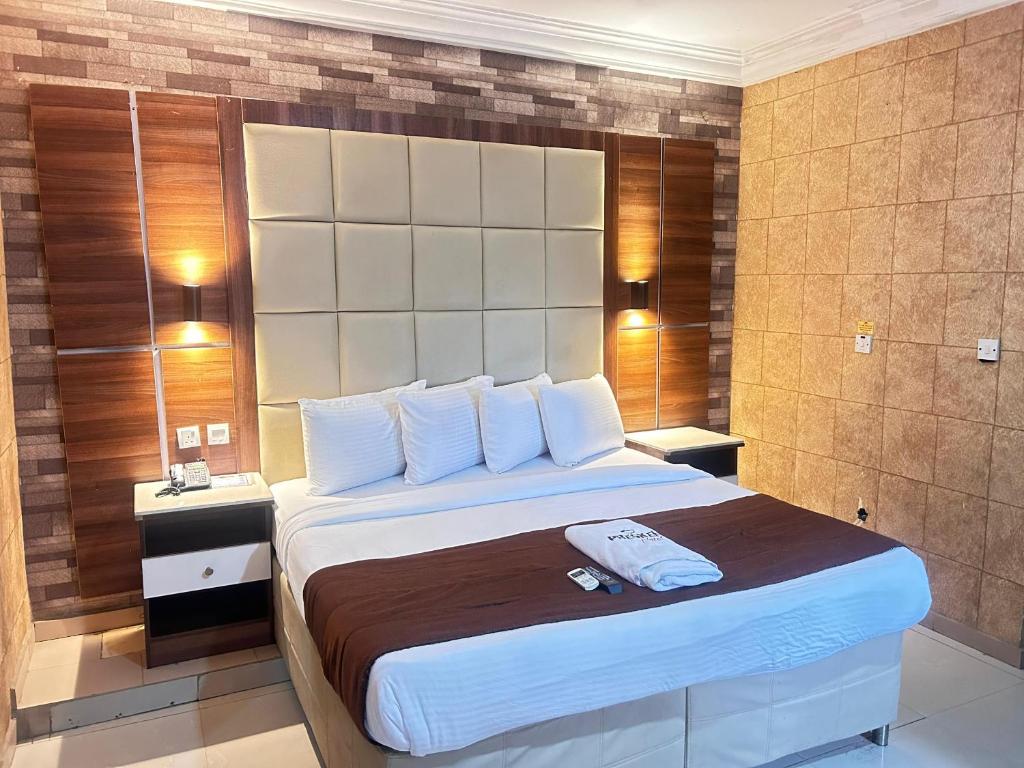 Postel nebo postele na pokoji v ubytování Presken Residence