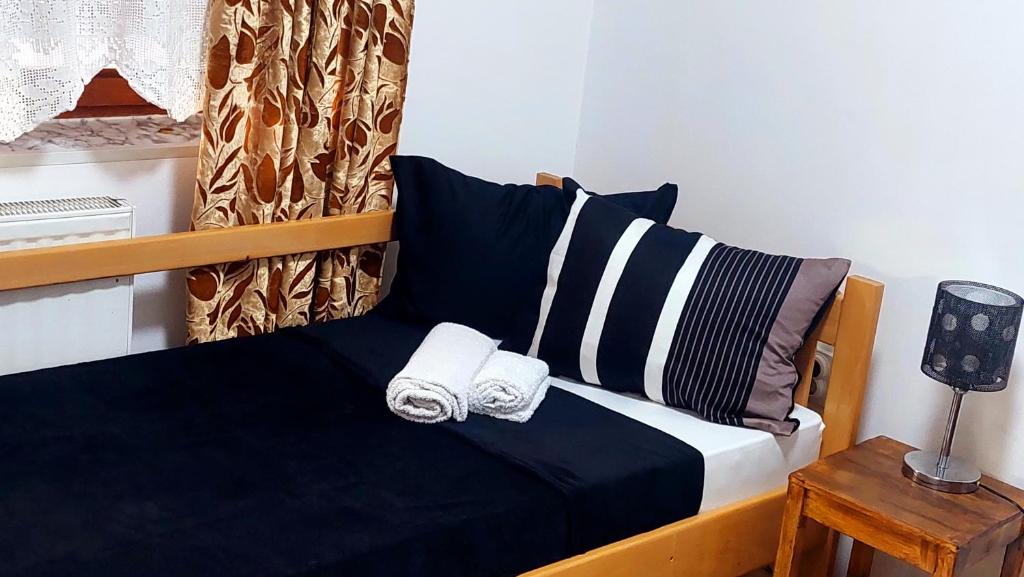 Postel nebo postele na pokoji v ubytování Spasojević Apartman