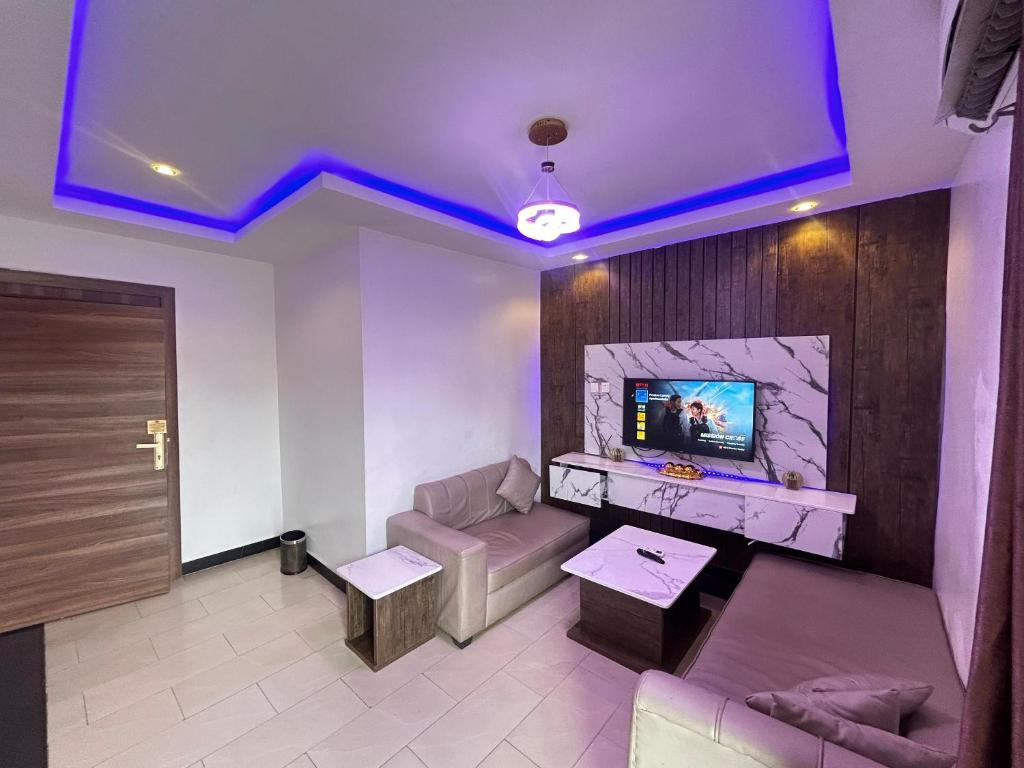 TV a/nebo společenská místnost v ubytování Presken Residence
