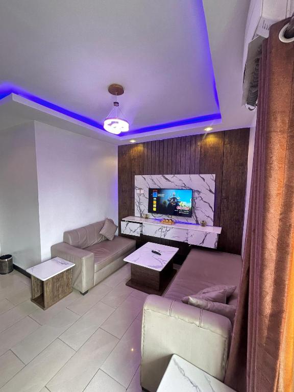 TV a/nebo společenská místnost v ubytování Presken Residence