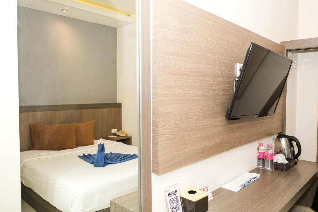 TV a/nebo společenská místnost v ubytování Hotel Dalu