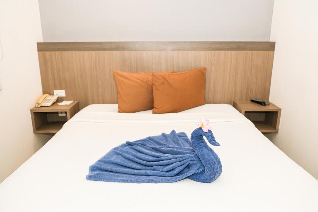 Postel nebo postele na pokoji v ubytování Hotel Dalu