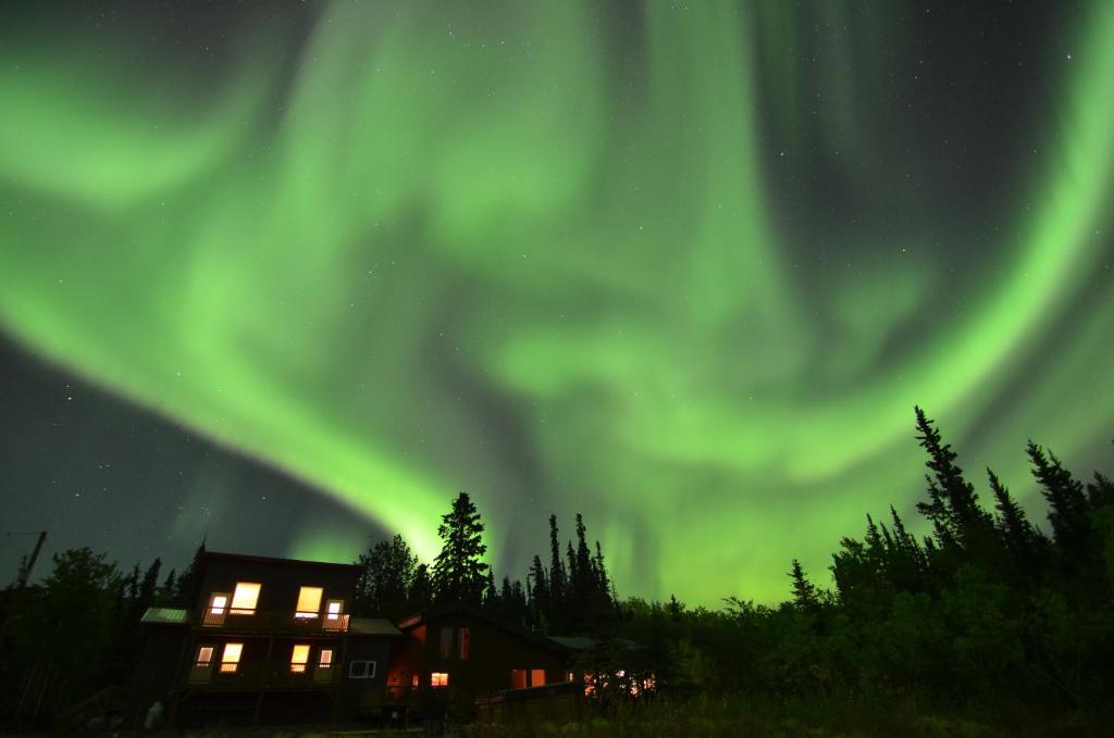 an image of the aurora borealis over a house at Boreale Ranch in Carcross