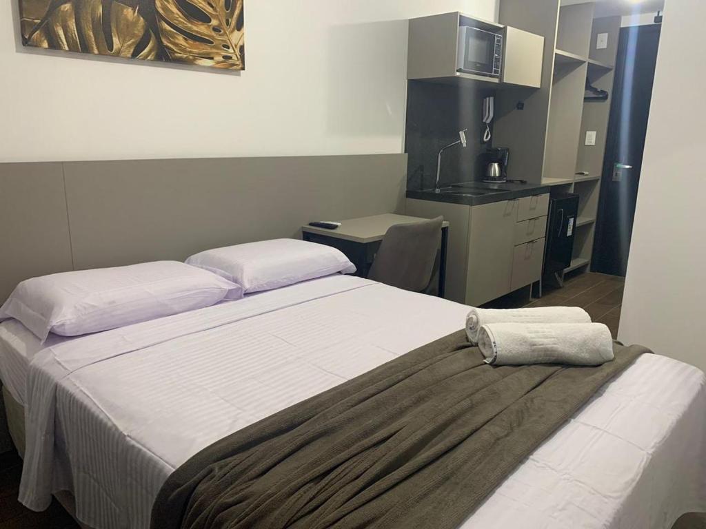 Ένα ή περισσότερα κρεβάτια σε δωμάτιο στο Flat MOVE proximo ao mar