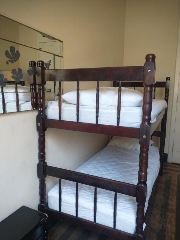 Postel nebo postele na pokoji v ubytování Guanaaní Hostel