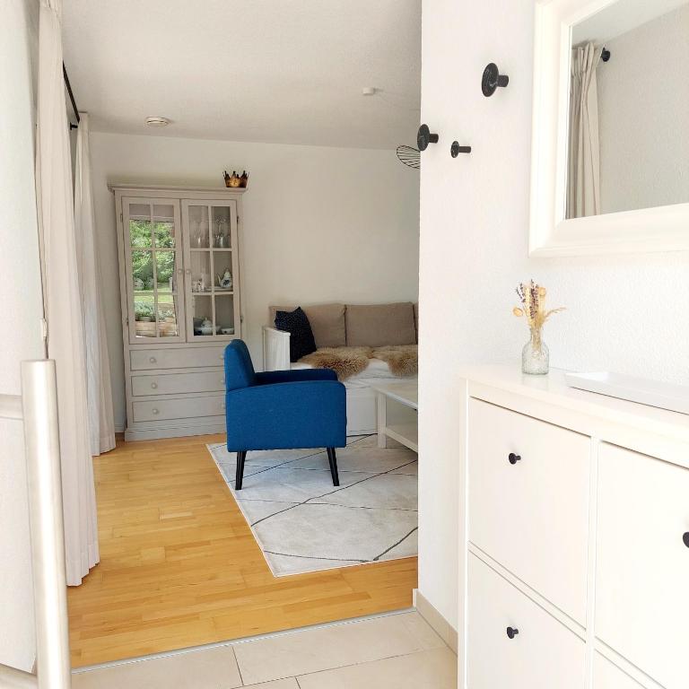 Postel nebo postele na pokoji v ubytování Otto drei - Ferienwohnung am Kaiserstuhl
