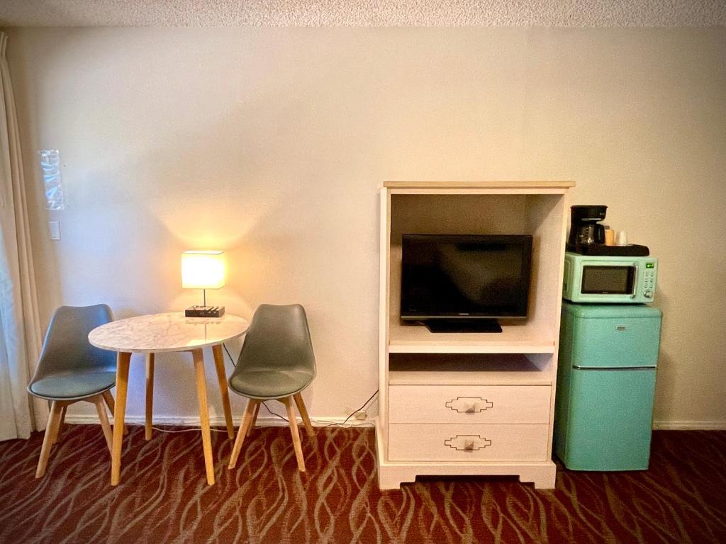 TV a/nebo společenská místnost v ubytování Sugar Loaf Lodge