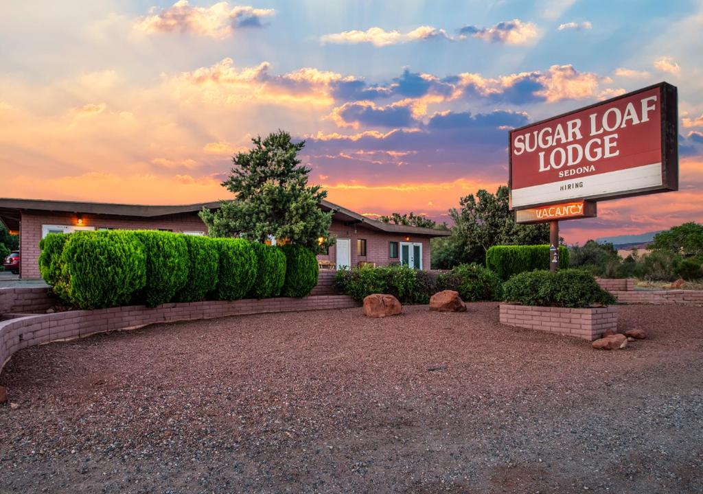 a sign for a signlor lord lodge in front of a building at Sugar Loaf Lodge in Sedona