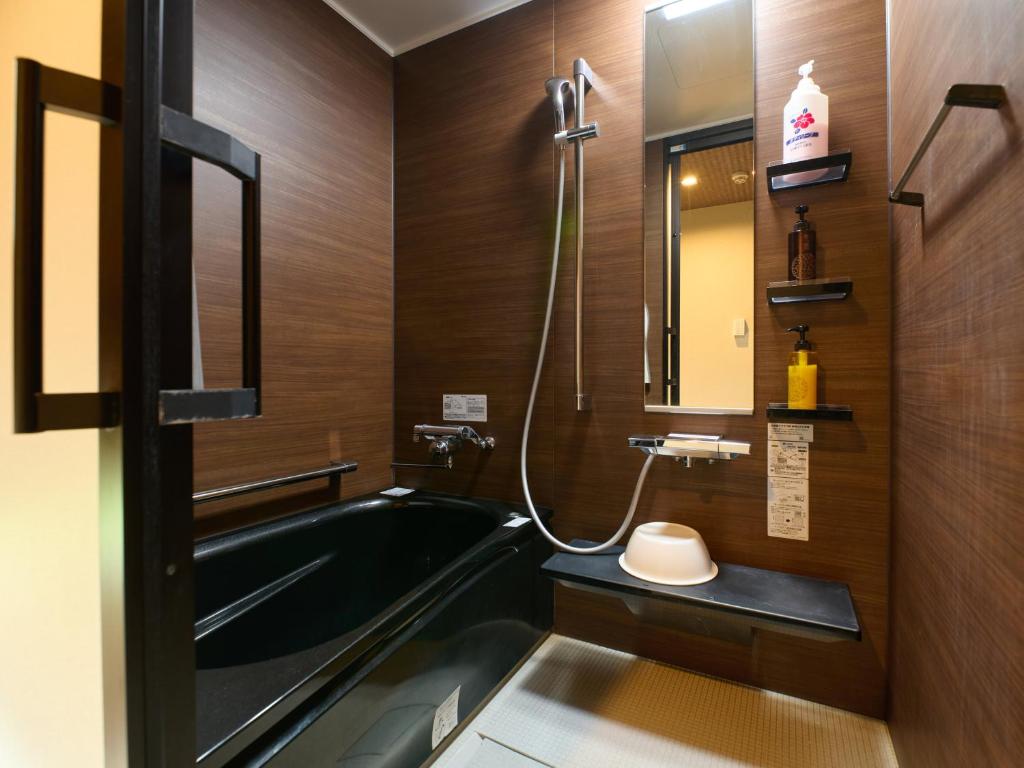 Koupelna v ubytování Tabist Hotel Seishokan