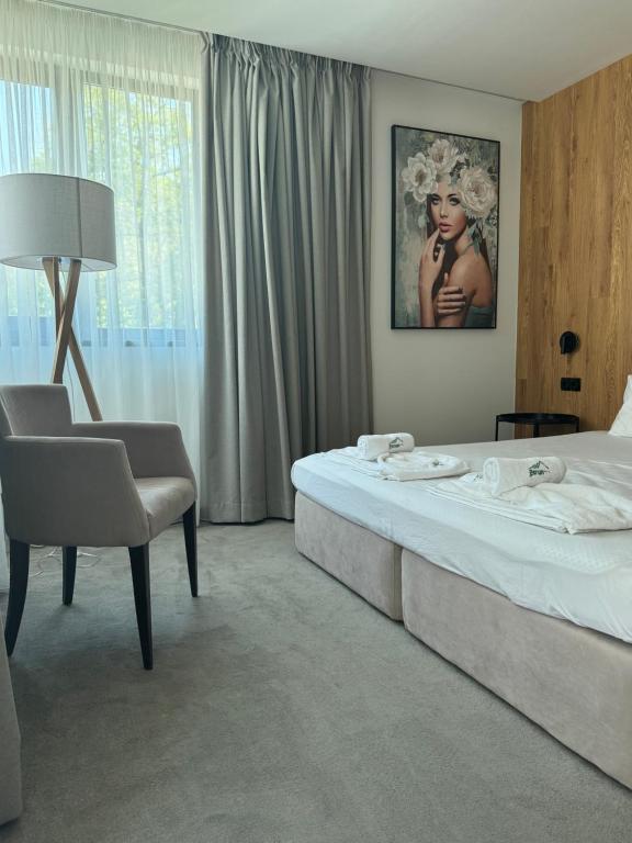 Postel nebo postele na pokoji v ubytování Perun Hotel Sandanski