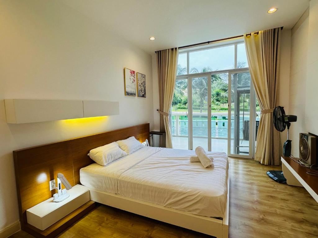 Ένα ή περισσότερα κρεβάτια σε δωμάτιο στο Ocean Vista Sea Links Mũi Né - Apartment 1,2&3 br