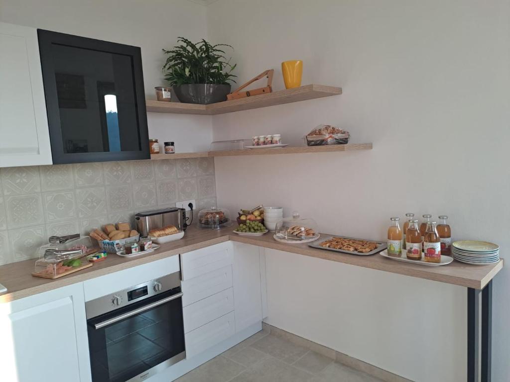 Kuchyň nebo kuchyňský kout v ubytování Habitat