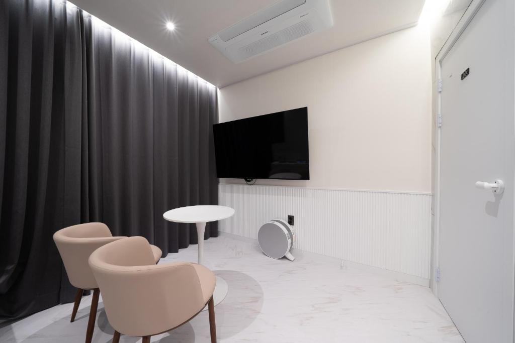 TV a/nebo společenská místnost v ubytování Gapyeong hotel GRAZIE