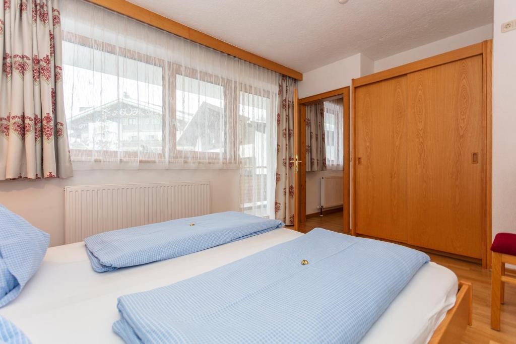Postel nebo postele na pokoji v ubytování Pension Schusterkrämer