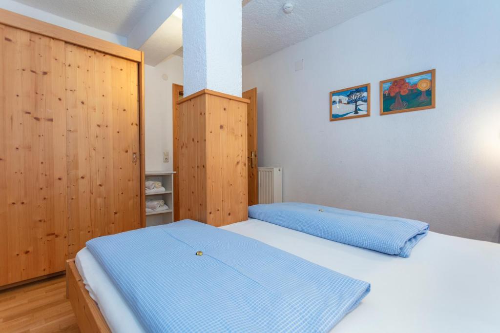 Postel nebo postele na pokoji v ubytování Pension Schusterkrämer