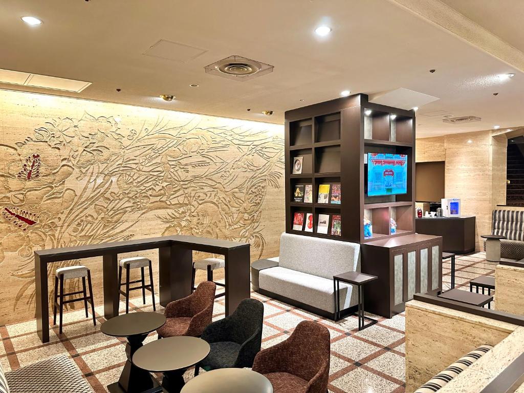 Posezení v ubytování New Osaka Hotel