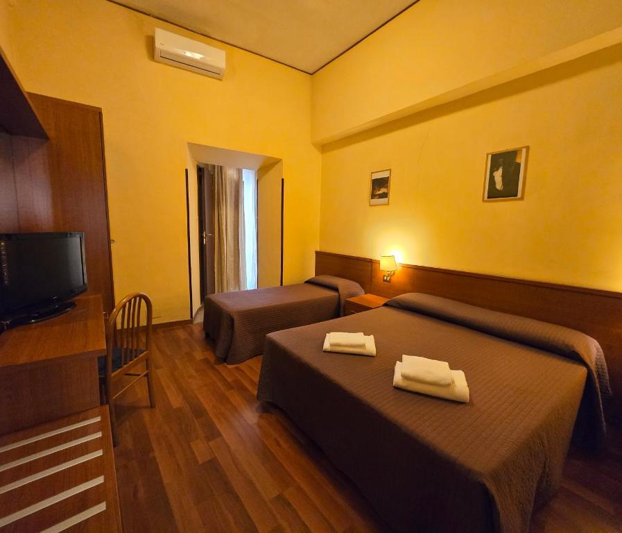TV a/nebo společenská místnost v ubytování Hotel Azzurra