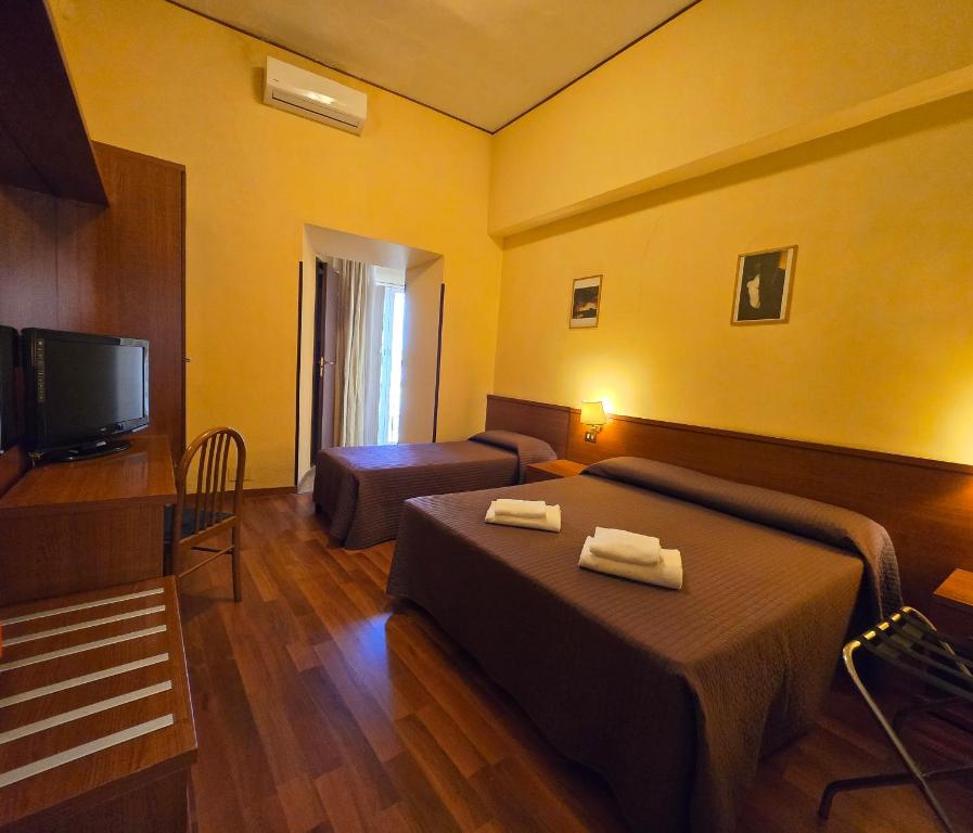 TV a/nebo společenská místnost v ubytování Hotel Azzurra