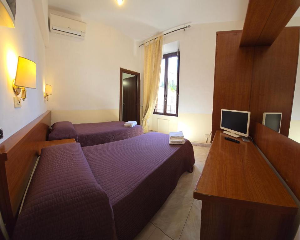 TV a/nebo společenská místnost v ubytování Hotel Azzurra