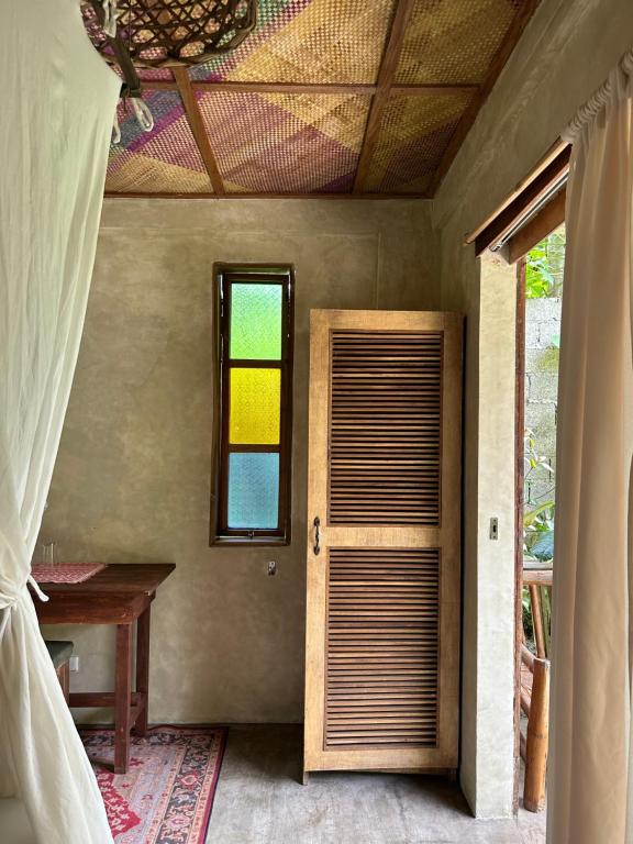 Letto o letti in una camera di Alpas Siargao