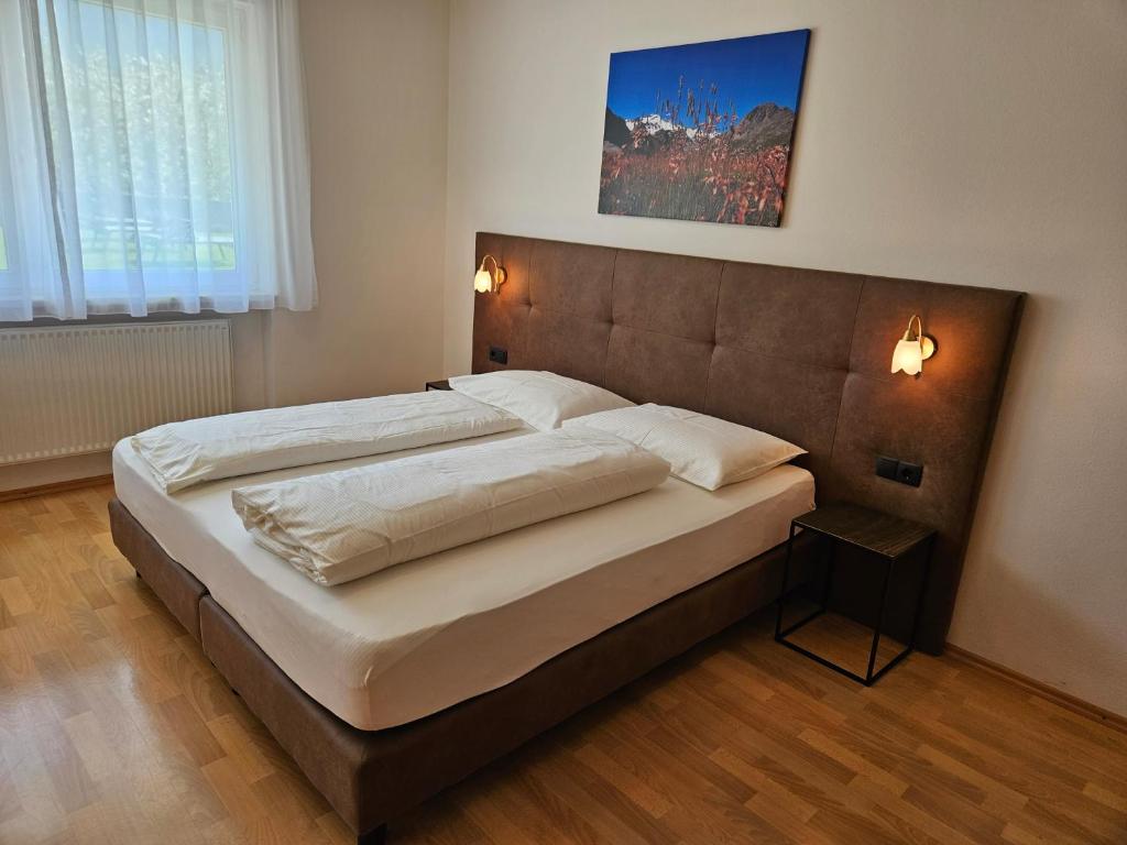Łóżko lub łóżka w pokoju w obiekcie Residence Obstgarten