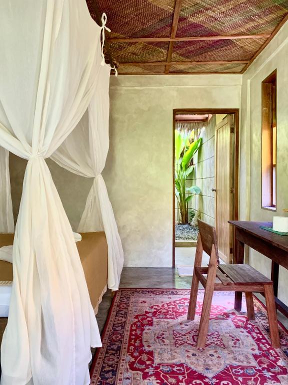 Letto o letti in una camera di Alpas Siargao