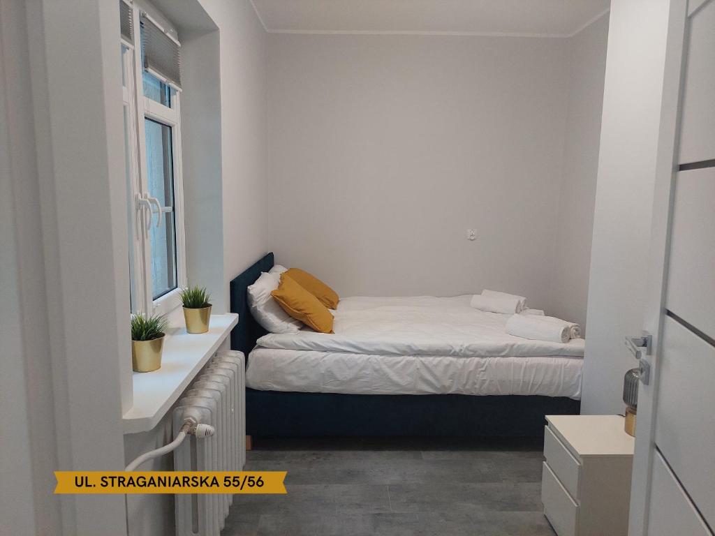 Posteľ alebo postele v izbe v ubytovaní Lunette Apartments