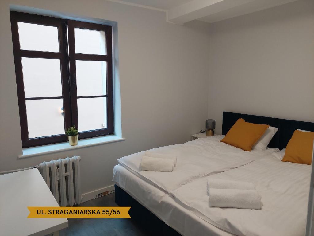 Posteľ alebo postele v izbe v ubytovaní Lunette Apartments