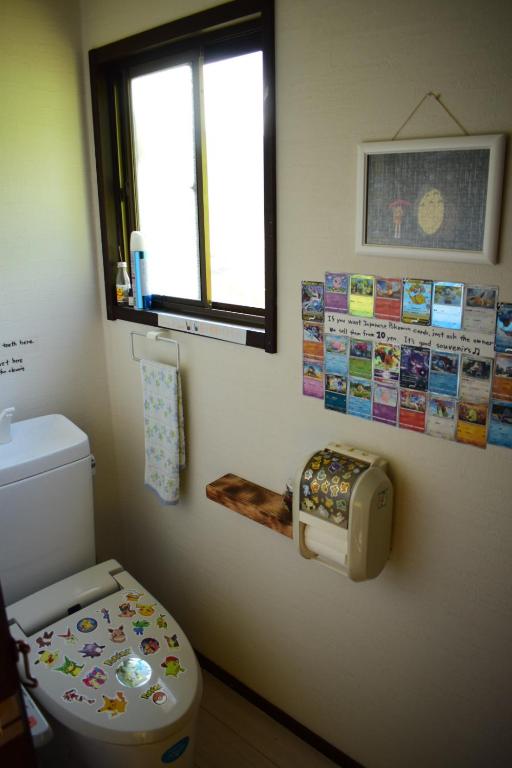 Koupelna v ubytování OMOLOSO Hostel　オモロソウ ホステル