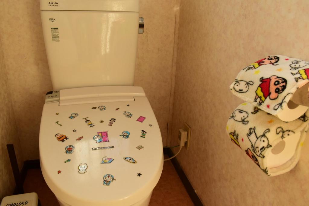 Koupelna v ubytování OMOLOSO Hostel　オモロソウ ホステル