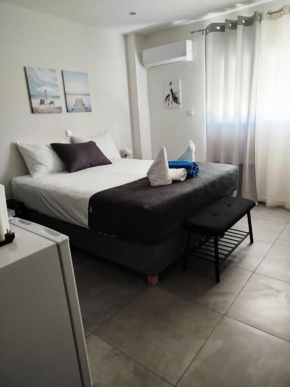 Postel nebo postele na pokoji v ubytování Aloha Inn