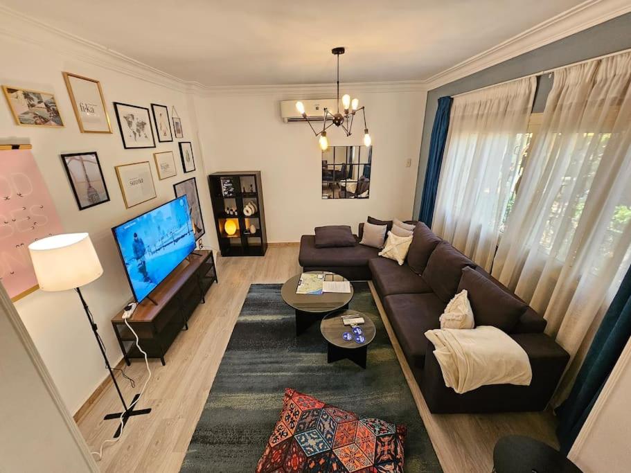 TV a/nebo společenská místnost v ubytování The Perfect Retreat Aprt in Degla