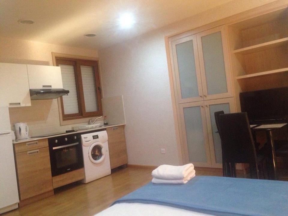 Kuchyň nebo kuchyňský kout v ubytování Les Palmiers Beach Boutique Hotel & Luxury Apartments