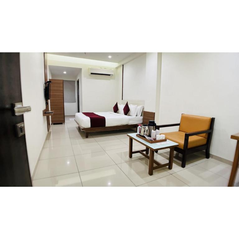 Posezení v ubytování Hotel Ashray Inn Express