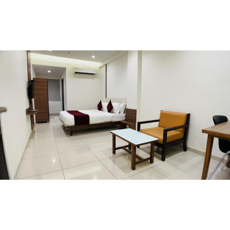 Posezení v ubytování Hotel Ashray Inn Express