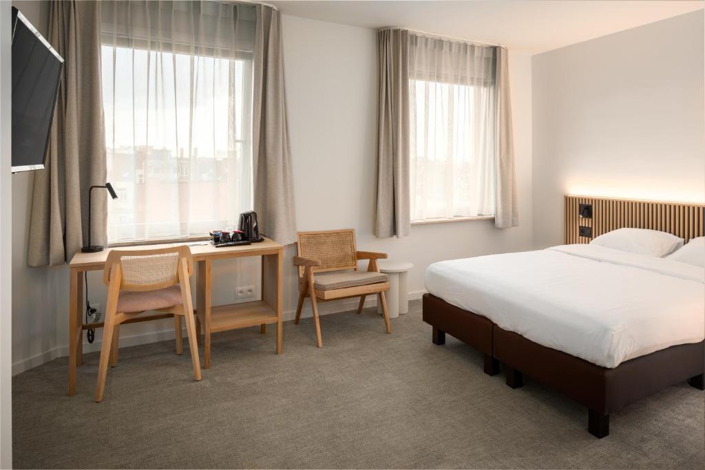 TV a/nebo společenská místnost v ubytování Hotel Chamade