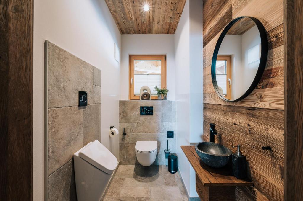 Koupelna v ubytování Almchalet - Luxus am Fuße der Koralpe