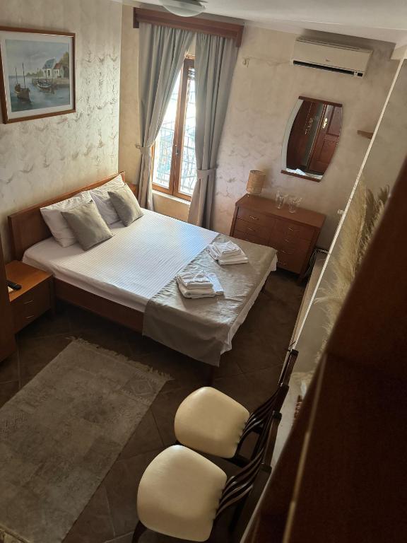 Postel nebo postele na pokoji v ubytování Hotel Anderba