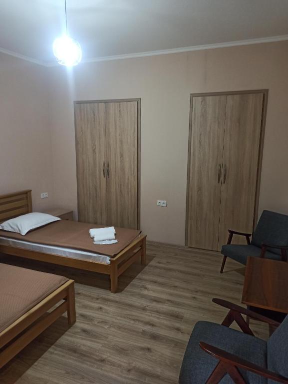 Postel nebo postele na pokoji v ubytování Bal's House