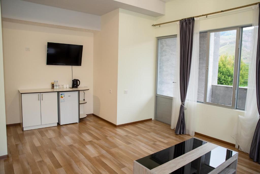 TV a/nebo společenská místnost v ubytování Magic View Hotel