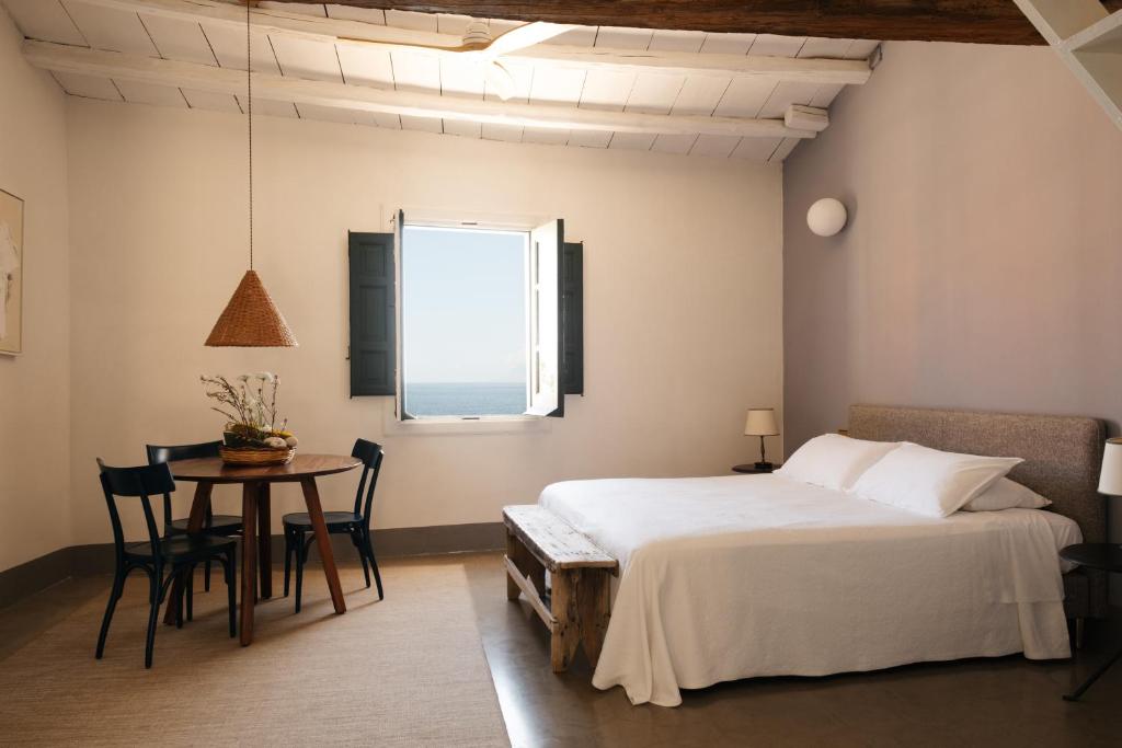 Postel nebo postele na pokoji v ubytování Tonnara di Scopello